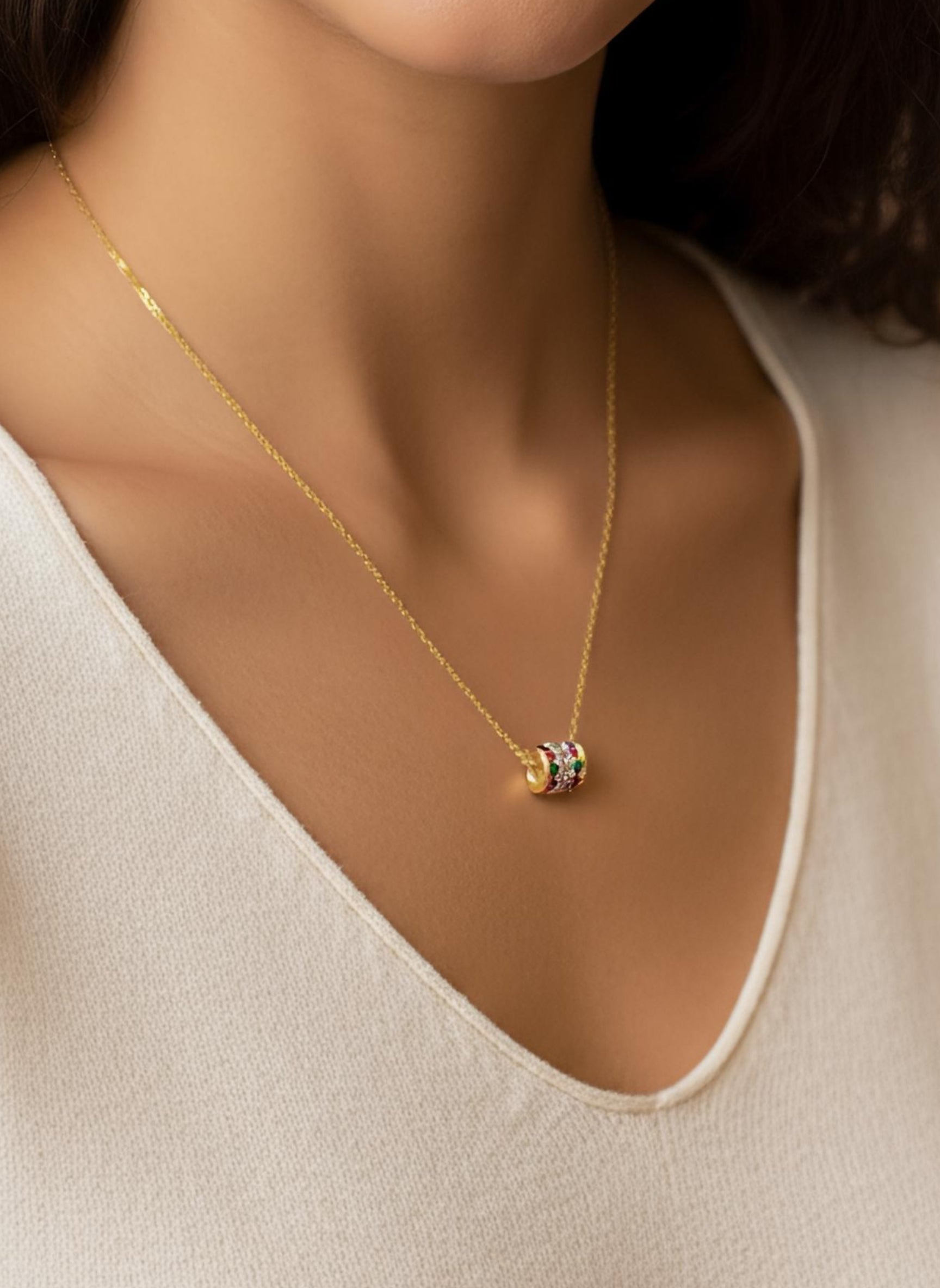 Close-up of Qyrisa Crest Round Lab Diamond Designer Pendant in 18K Yellow Gold by Fiona Diamonds