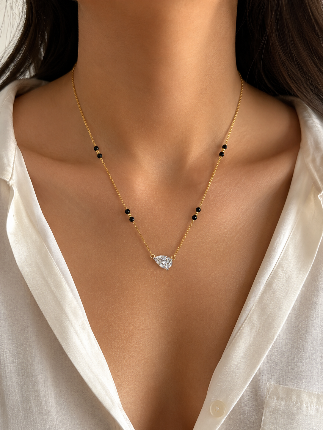 Side view of Farieth Crest Pear Lab Diamond Mangalsutra in 18K Yellow Gold - Fiona Diamonds