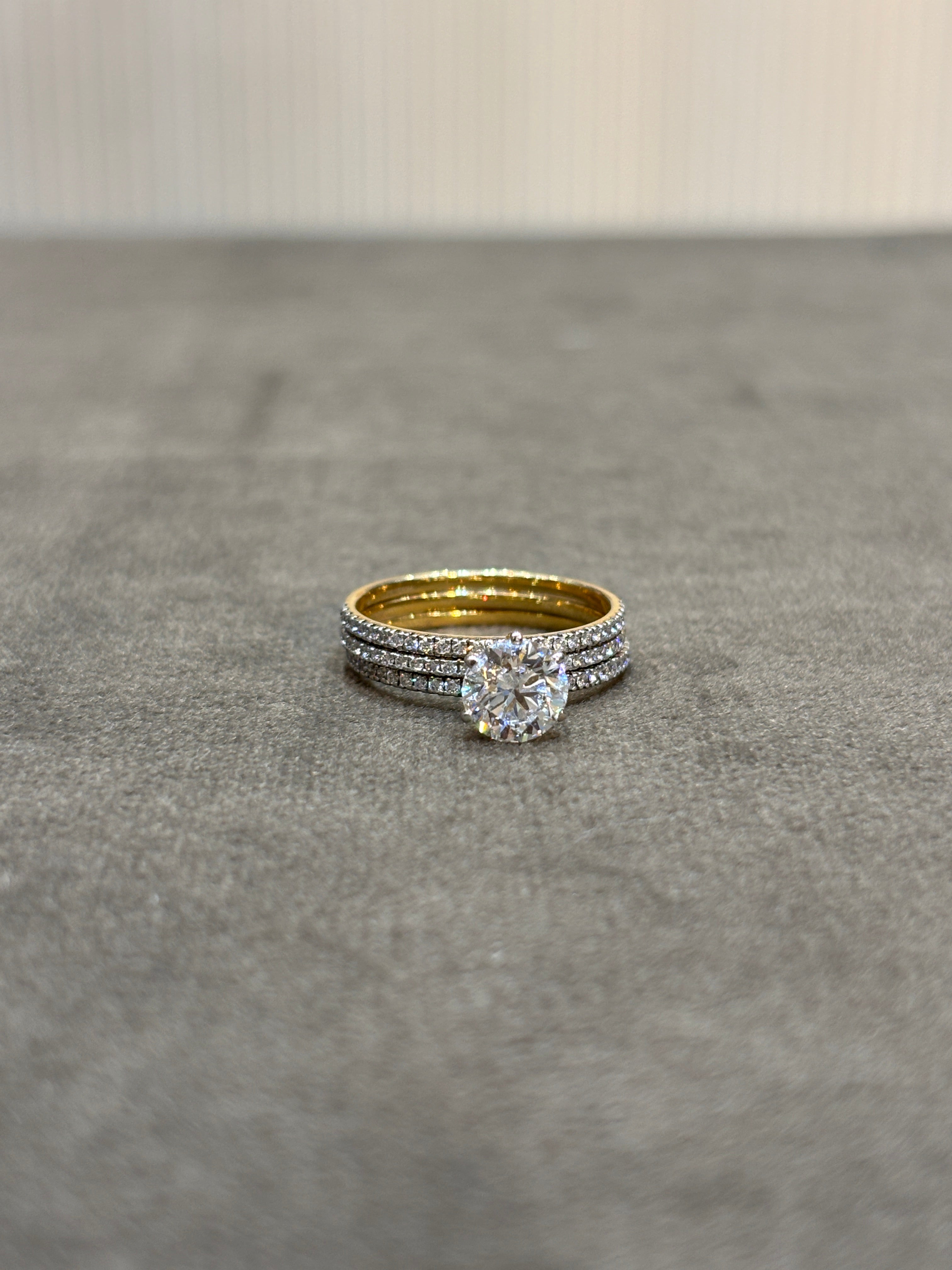 Close-up of Evren Callo Round Lab Diamond Classic Solitaire Ring set in 18K Yellow Gold by Fiona Diamonds