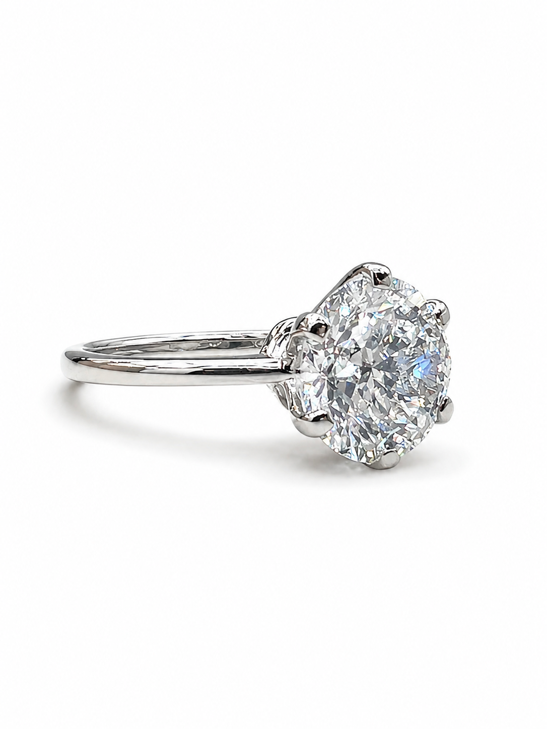Close-up of Daxton Lace Round Lab Diamond Classic Solitaire Ring set in 18K White Gold by Fiona Diamonds