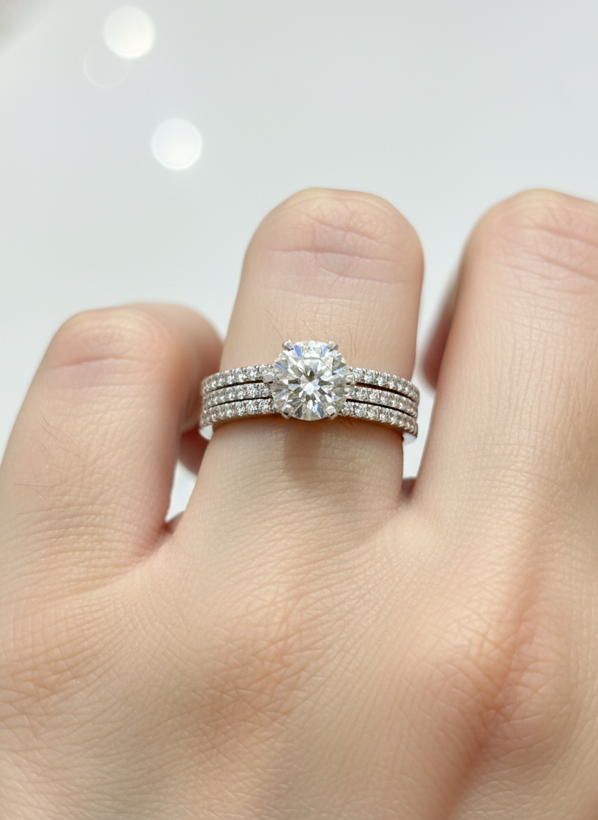Side view of Tavion Crest Round Lab Diamond Side Stone Solitaire Ring in 18K White Gold  Fiona Diamonds