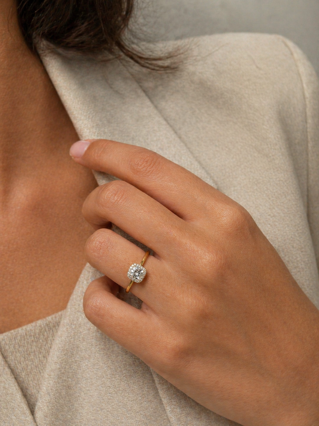 Close-up of Kestrel Dawn Cushion Lab Diamond Halo Ring set in 18K Yellow Gold by Fiona Diamonds