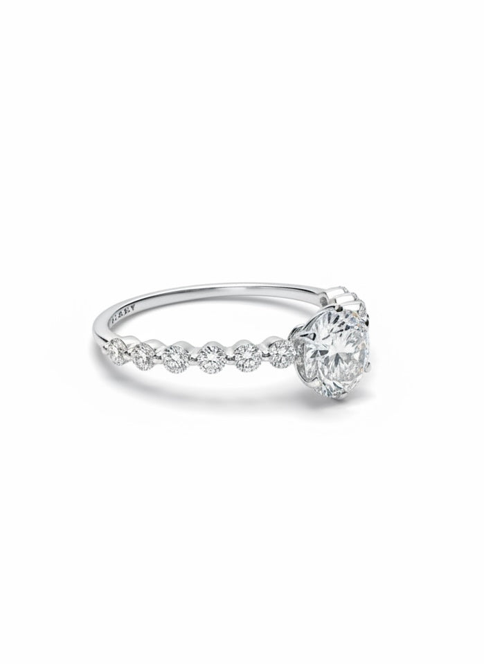 Side view of Avyrel Band Round Lab Diamond Side Stone Solitaire Ring in 18K White Gold  Fiona Diamonds