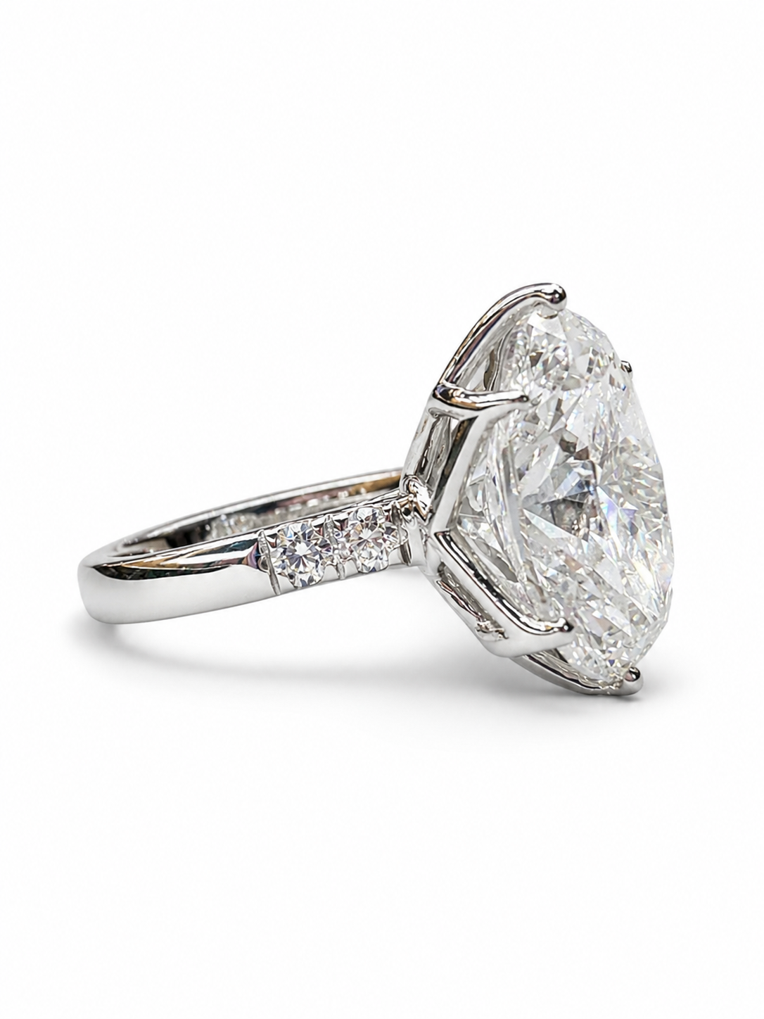 Side view of Briar Crown Oval Lab Diamond Side Stone Solitaire Ring in 18K White Gold  Fiona Diamonds
