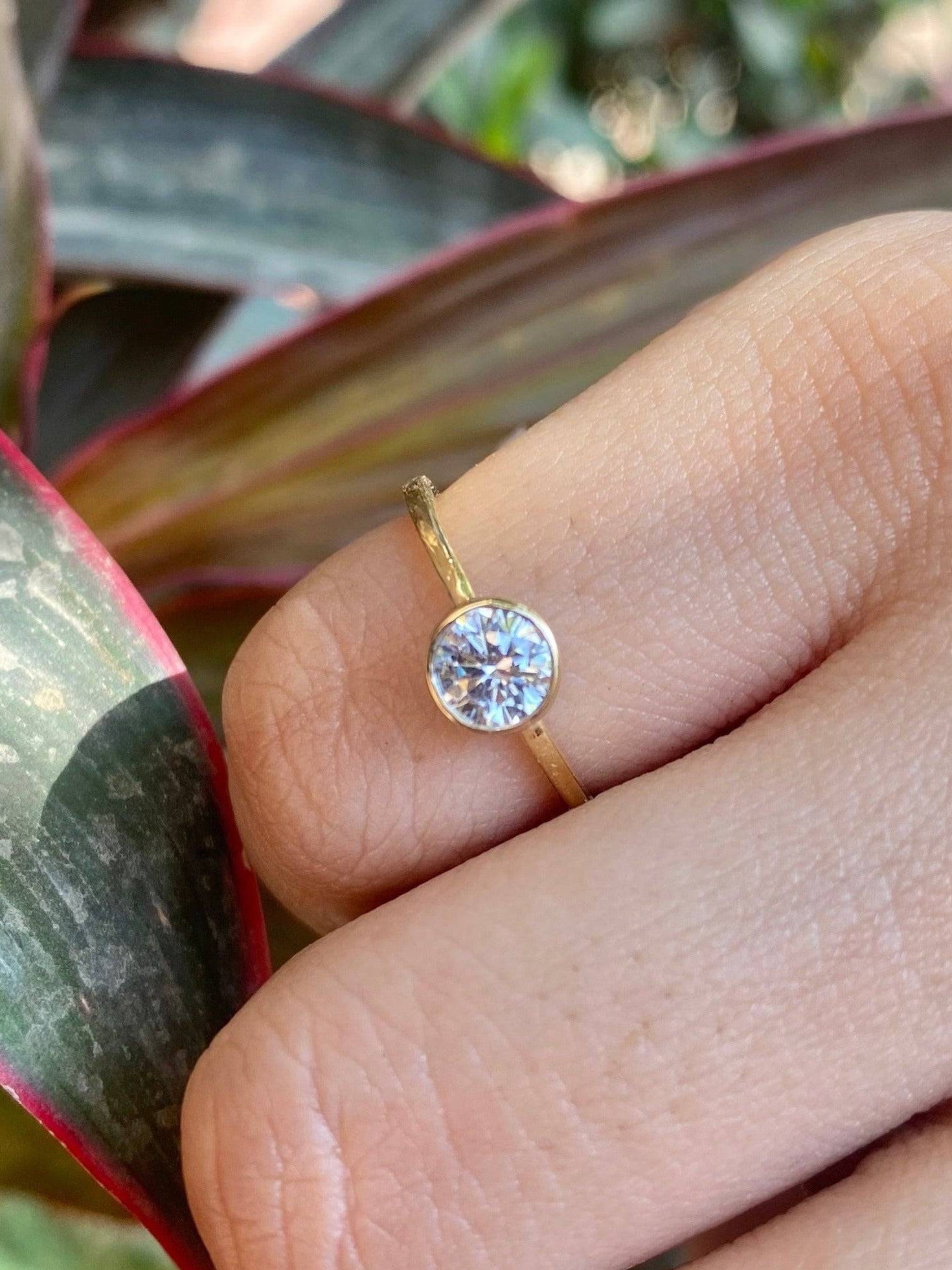 Close-up of Kiyaara 53 Pointer Round Lab Diamond Classic Solitaire Ring set in 18K Yellow Gold by Fiona Diamonds