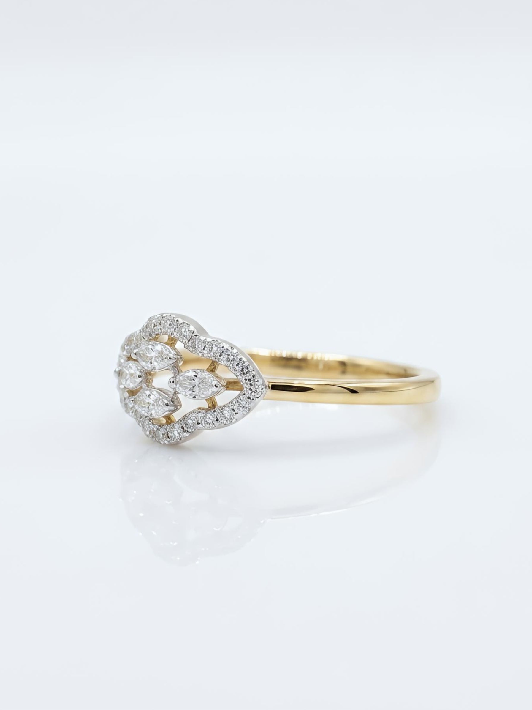 Close -up of Maven Lace Round Lab Diamond Designer Ring set in 14K Yellow Gold by Fiona Diamonds