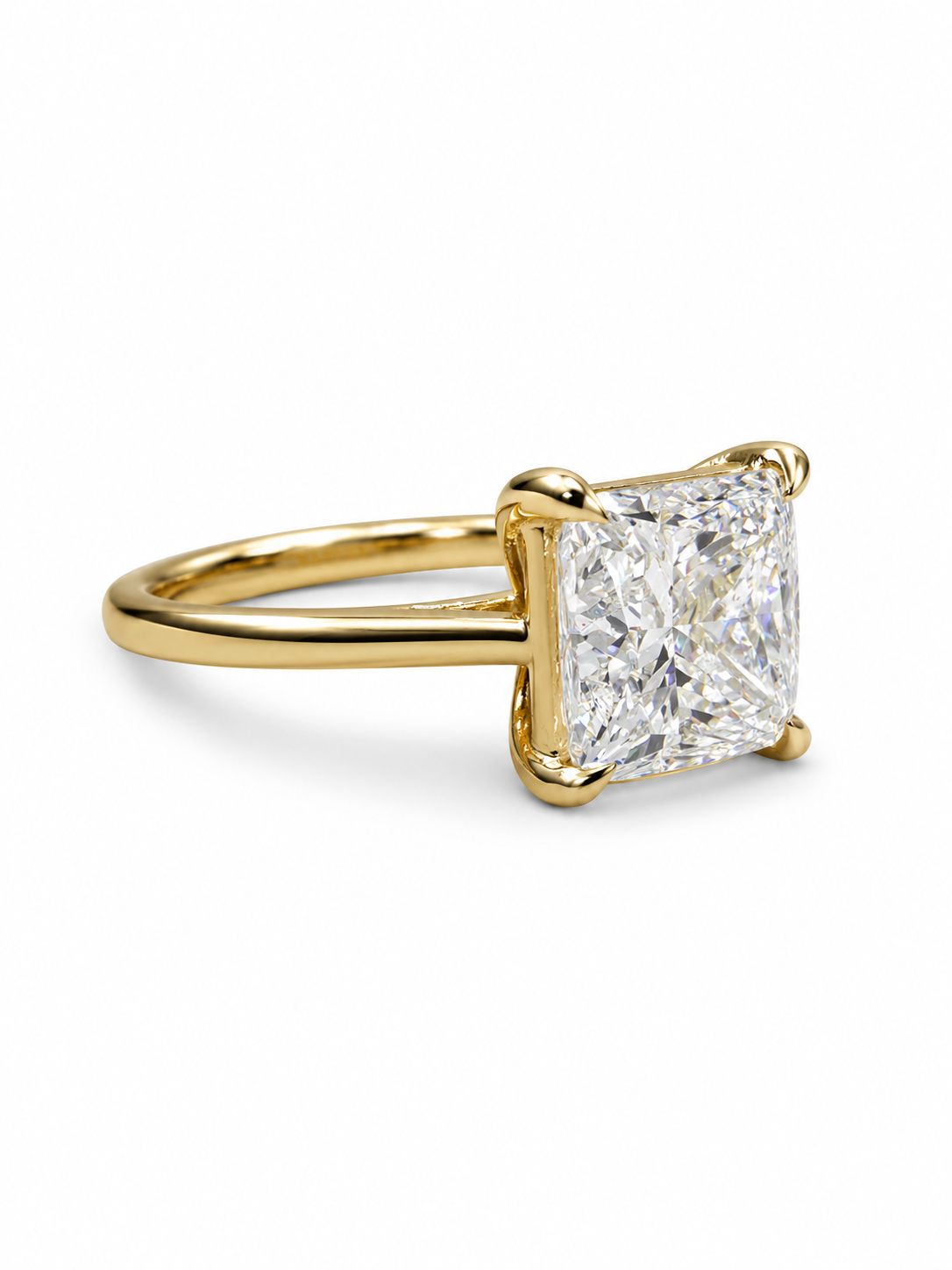 Close-up of Aevyn Haze Princess Lab Diamond Classic Solitaire Ring set in 18K Yellow Gold by Fiona Diamonds