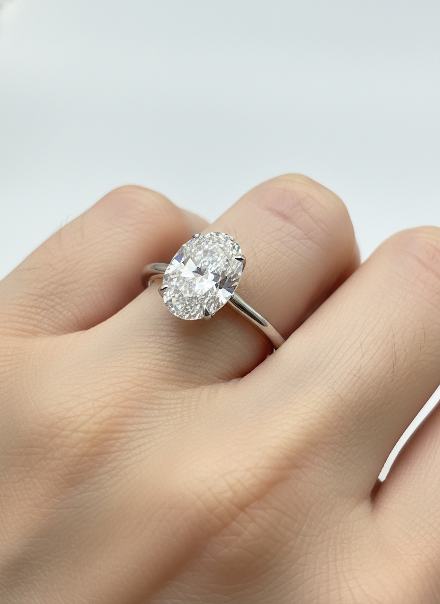 Side profile of Baelith Crest Oval Lab Diamond Classic Solitaire Ring in 18K White Gold Fiona Diamonds