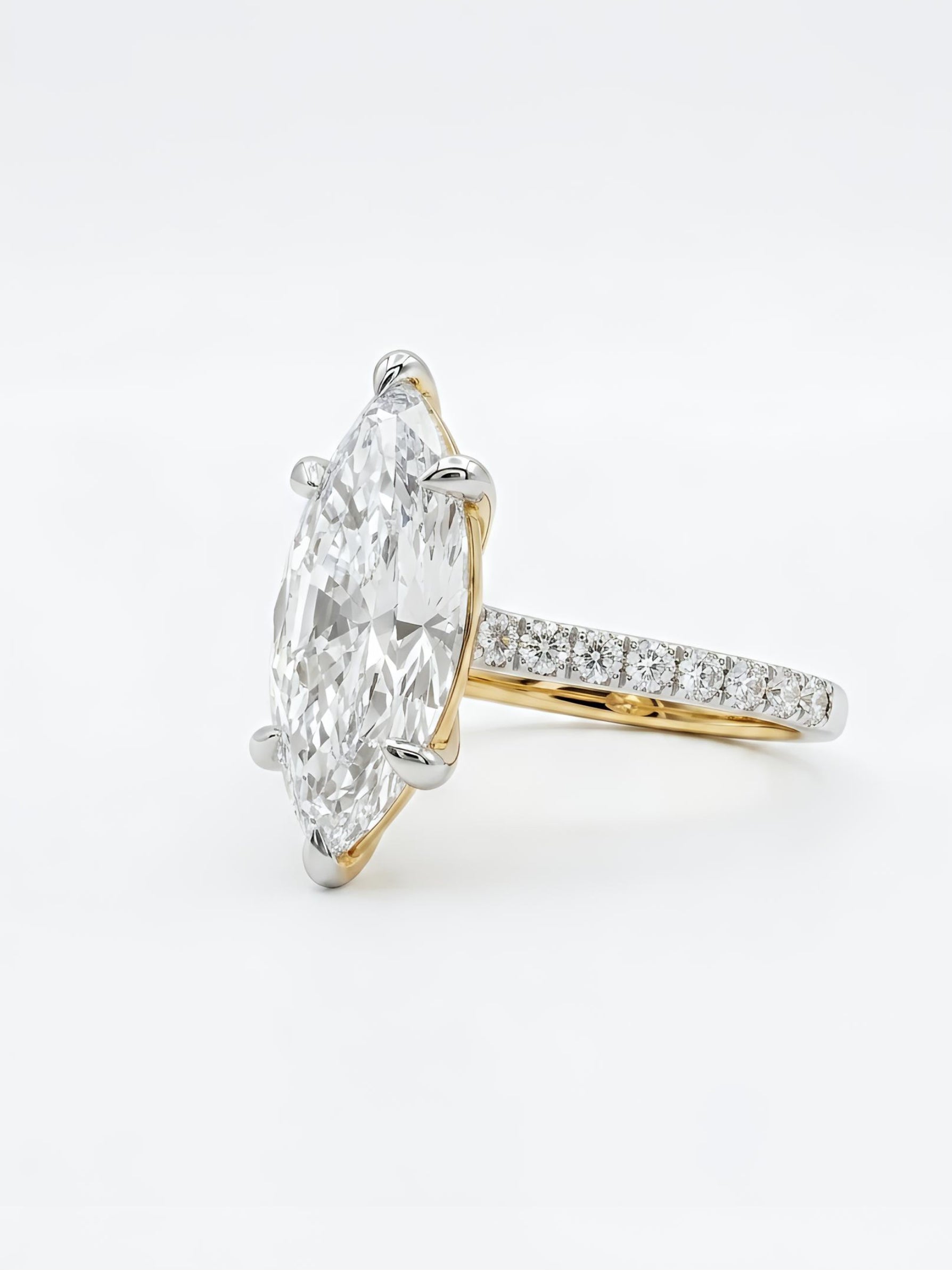 Close-up of Piren Drift Marquise Lab Diamond Classic Solitaire Ring set in 14K Yellow Gold by Fiona Diamonds