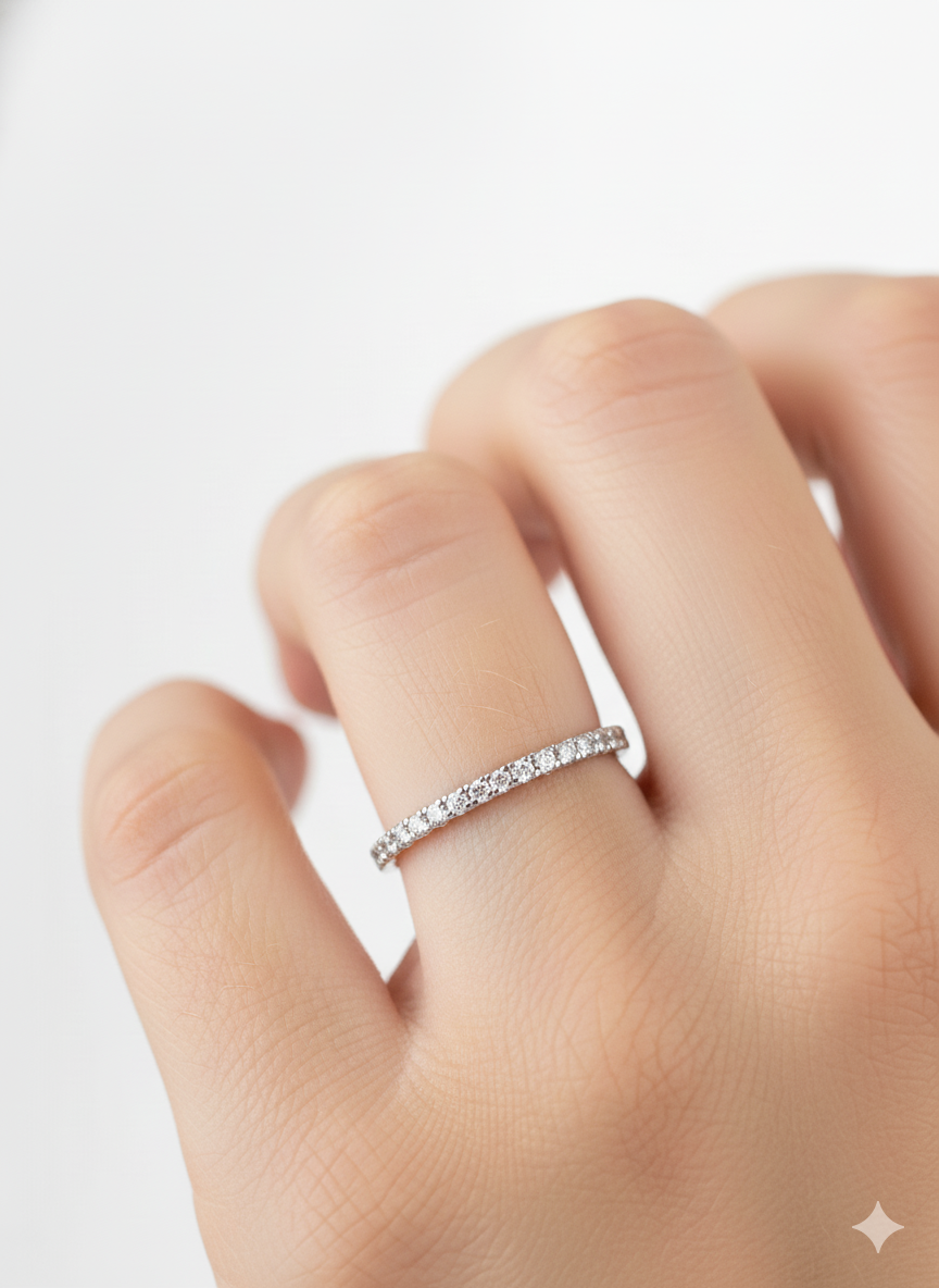 Close-up of Emmeline Round Lab Diamond Eternity Ring set in 18K White Gold by Fiona Diamonds
