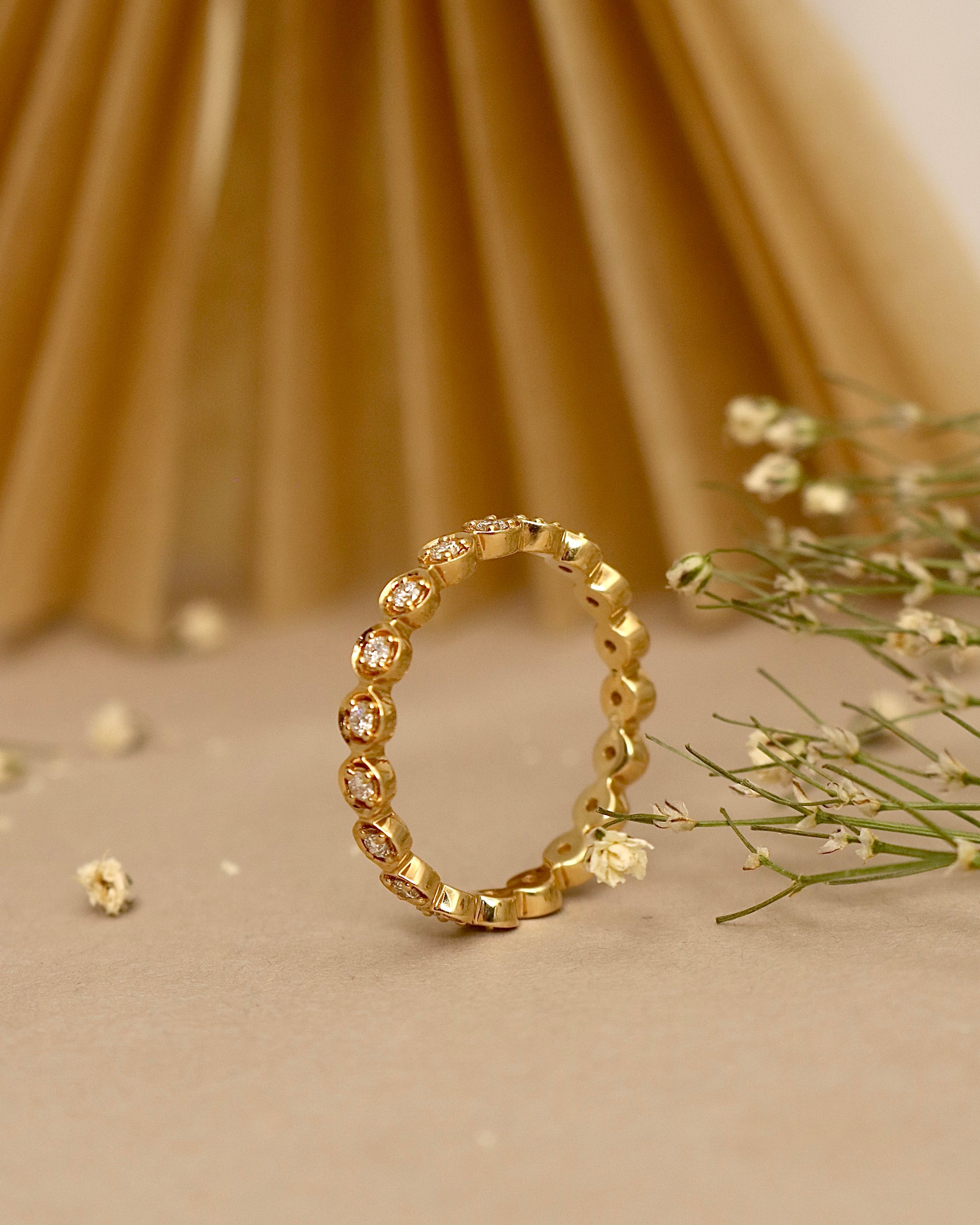 Fiona Diamonds Wanyi Round Lab Diamond Eternity Ring in 18K Yellow Gold on hand