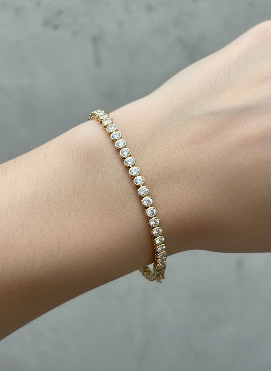 Close-up of Solviera Vibe Round Lab Diamond Tennis Bracelet in 18K Yellow Gold by Fiona Diamonds