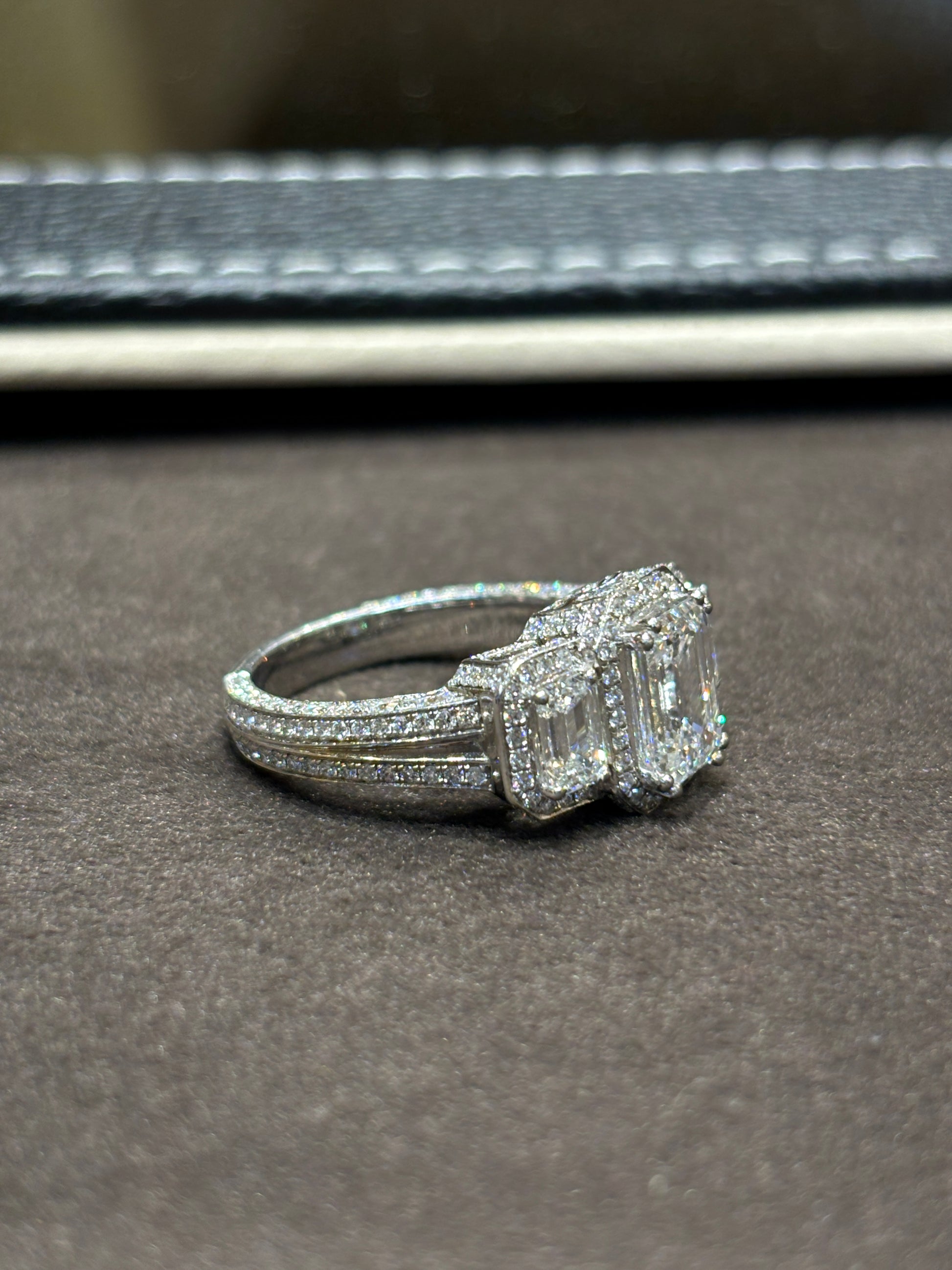 Close-up of Yara Emerald Lab Diamond Three Stone Ring set in 14K White Gold by Fiona Diamonds