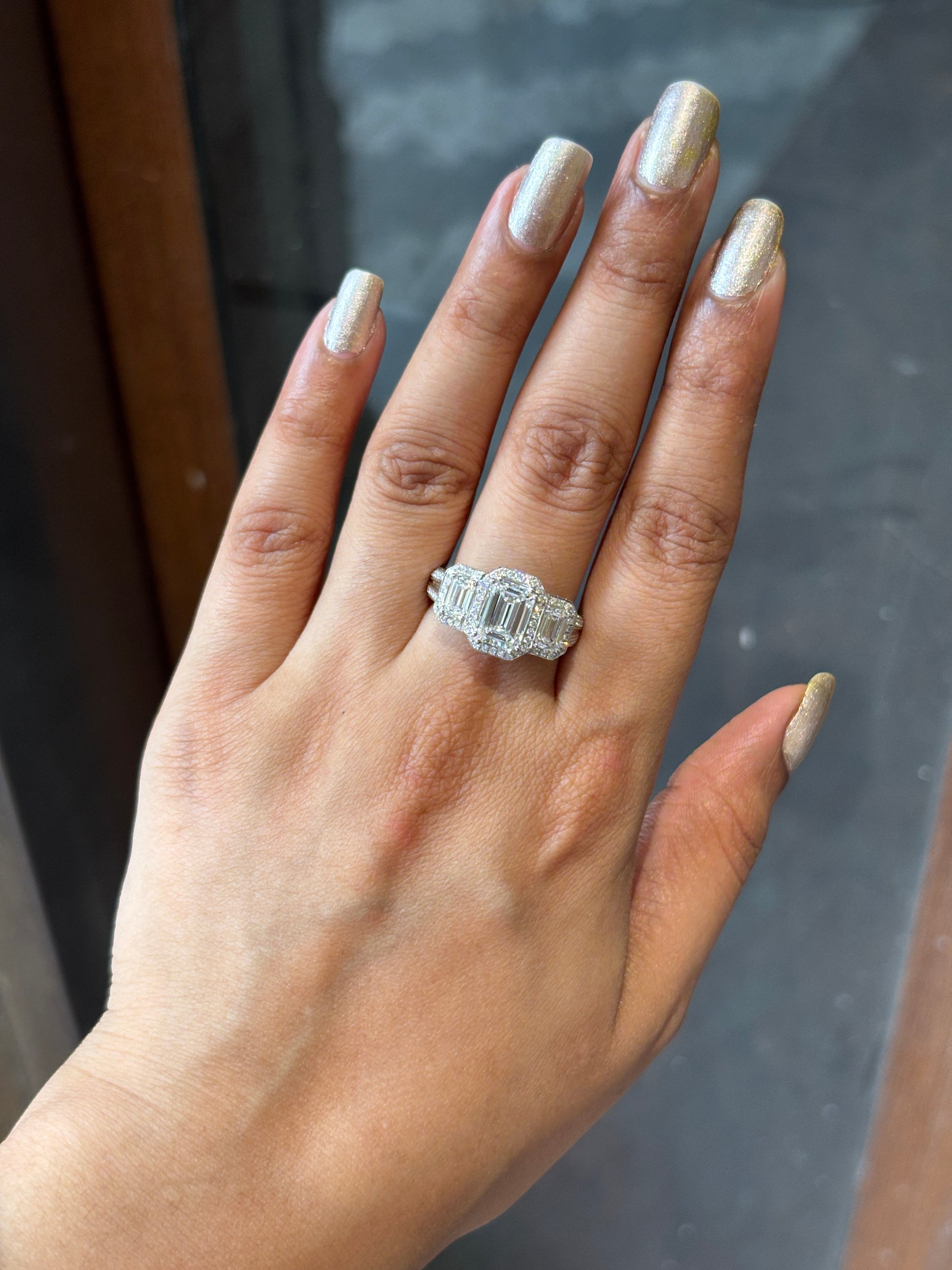 Side view of Yara Emerald Lab Diamond Three Stone Ring in 14K White Gold - Fiona Diamonds
