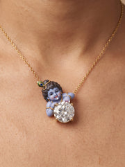 Natkhat Kanha — enamel Bal Krishna leaning over the diamond with butter still on his lips, round lab-grown diamond pendant in yellow gold, Fiona Diamonds