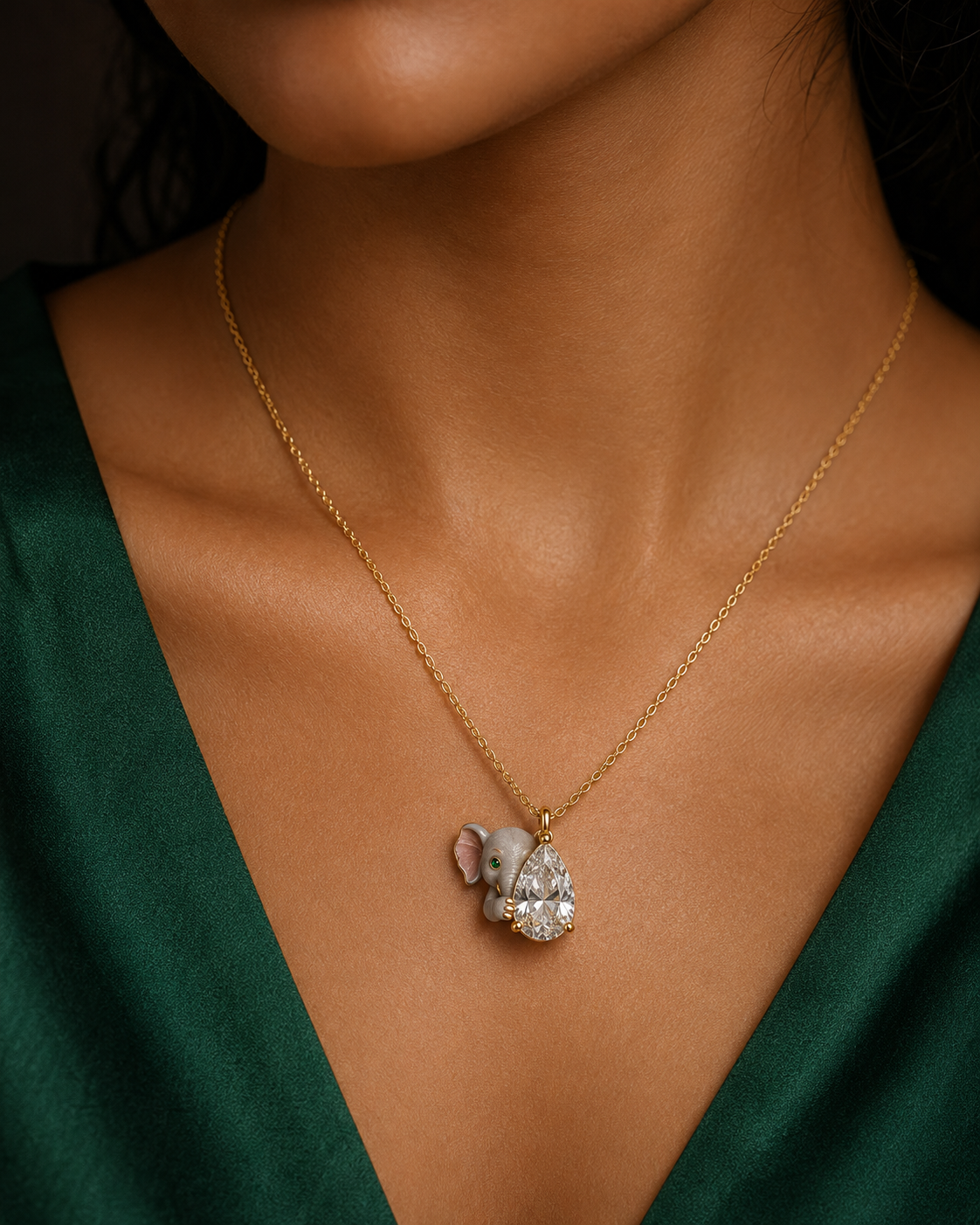 Peeping elephant lab grown diamond pendant in gold - pear cut solitaire with hand-enamelled grey elephant, pink inner ear and emerald eye - Fiona Diamonds