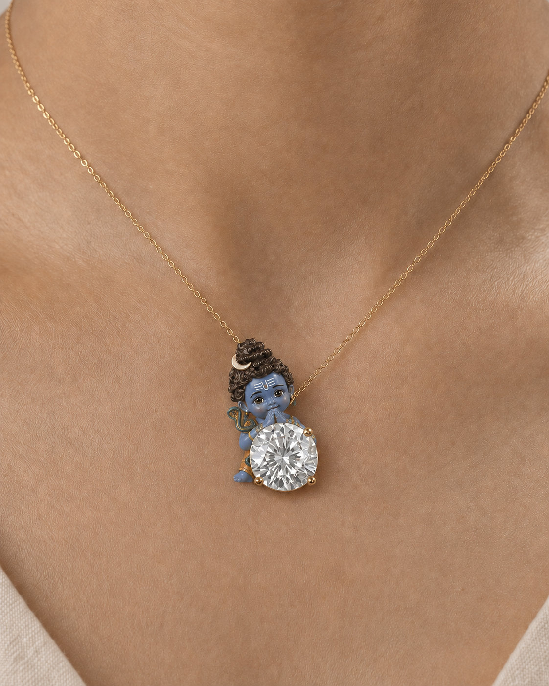 Namah Shivaya — enamel Bal Shiva with palms joined in prayer above the diamond, round lab-grown diamond pendant in yellow gold, Fiona Diamonds