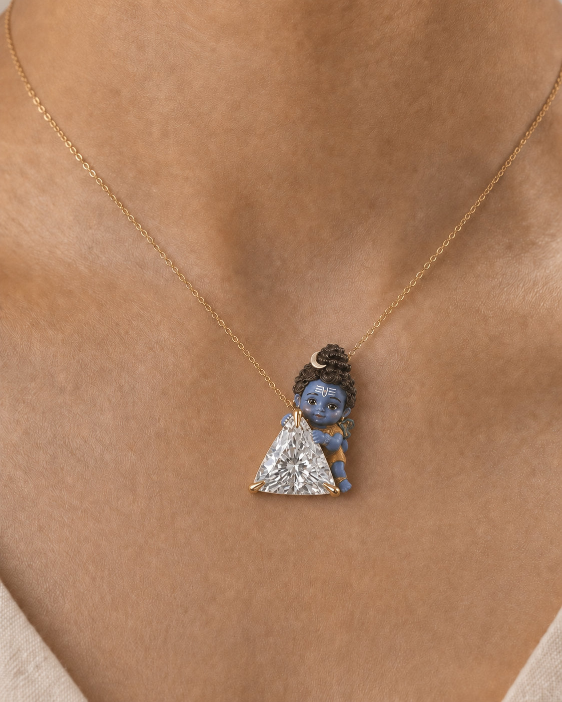 Neelkanth — enamel Bal Shiva peeking from beside the trillion, trillion lab-grown diamond pendant in yellow gold, Fiona Diamonds