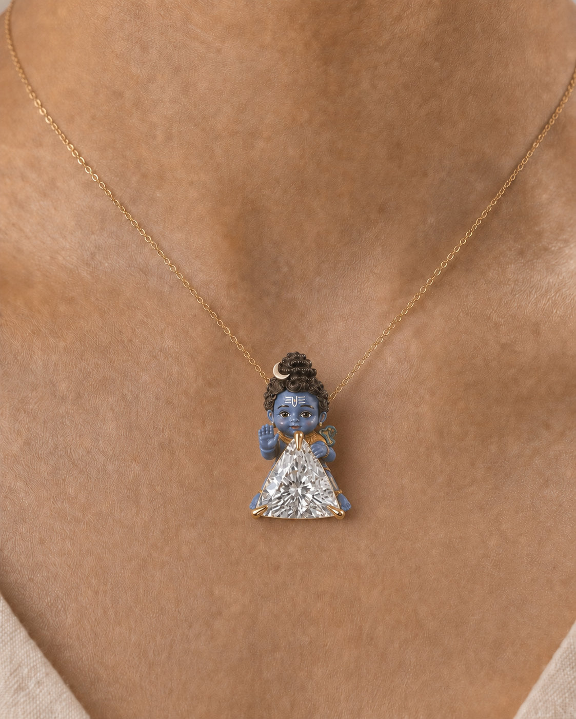 Trinetra — enamel Bal Shiva blessing from behind the trillion, trillion lab-grown diamond pendant in yellow gold, Fiona Diamonds