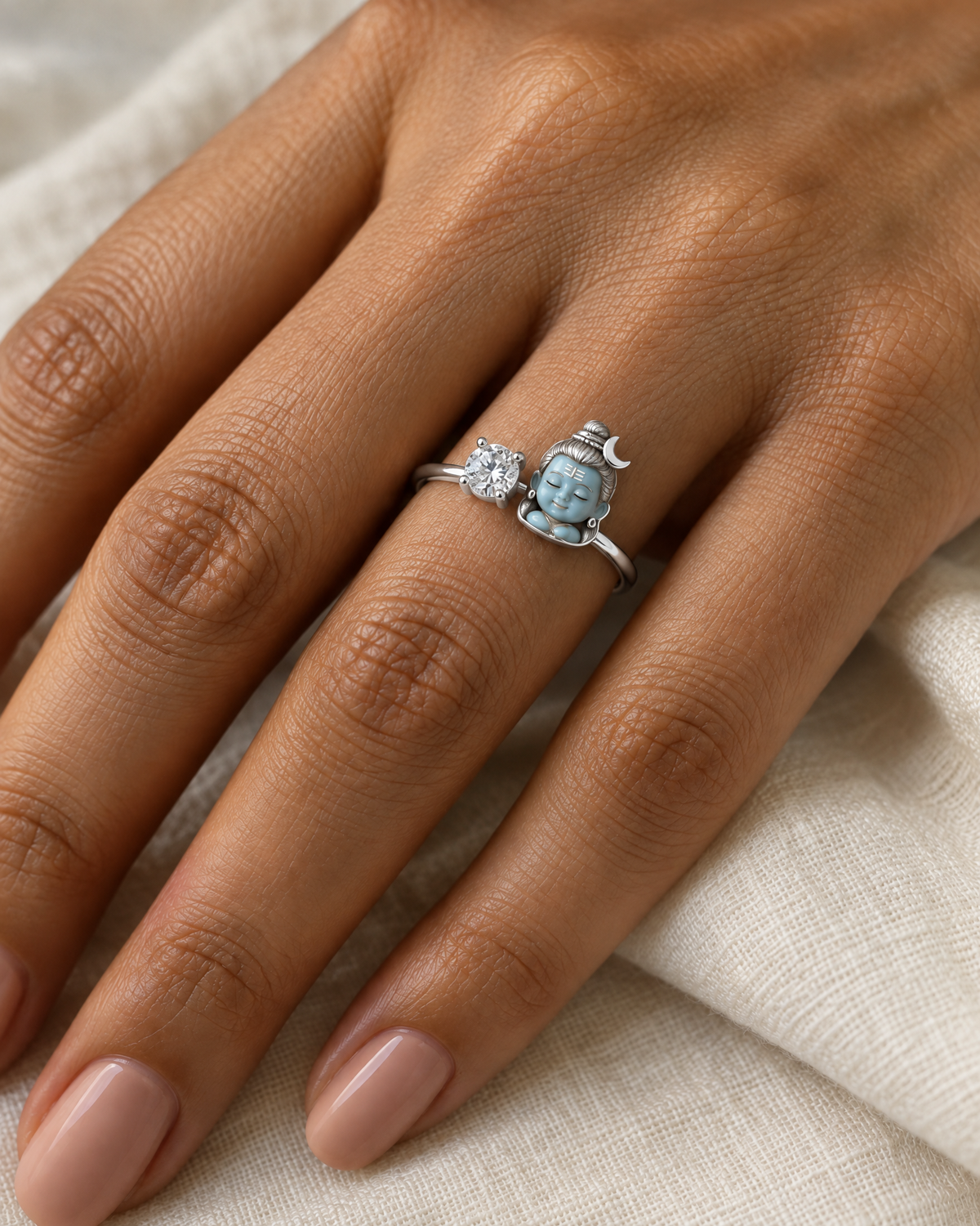 Bal Shiva Namaste ring in polished 925 silver, worn on the hand