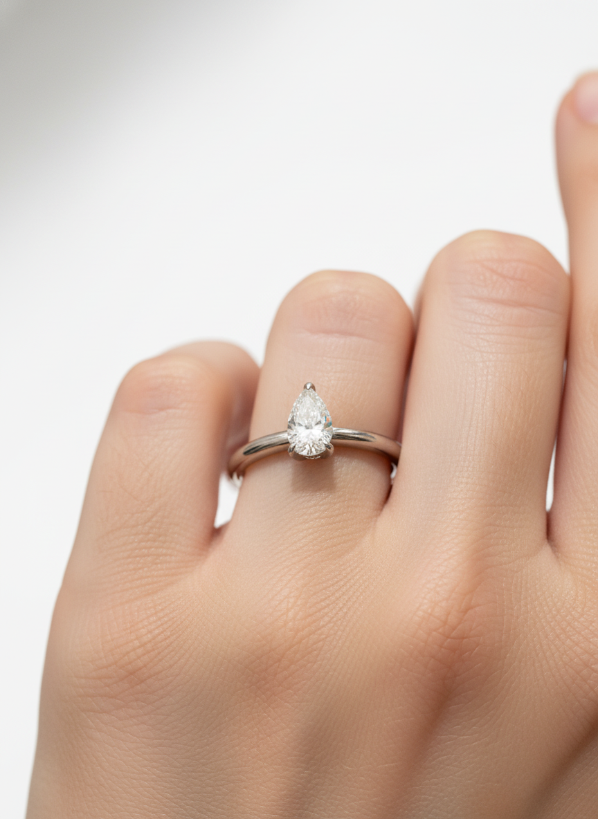 Close-up of Azurelle 51 Pointer Pear Lab Diamond Classic Solitaire Ring set in 14K White Gold by Fiona Diamonds