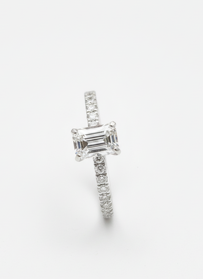 Close-up of QuantaPulse 50 Pointer Lab Grown Diamond Ring - Radiant & Elegant Emerald Lab Diamond Side Stone Solitaire Ring set in 18K Rose Gold by Fiona Diamonds
