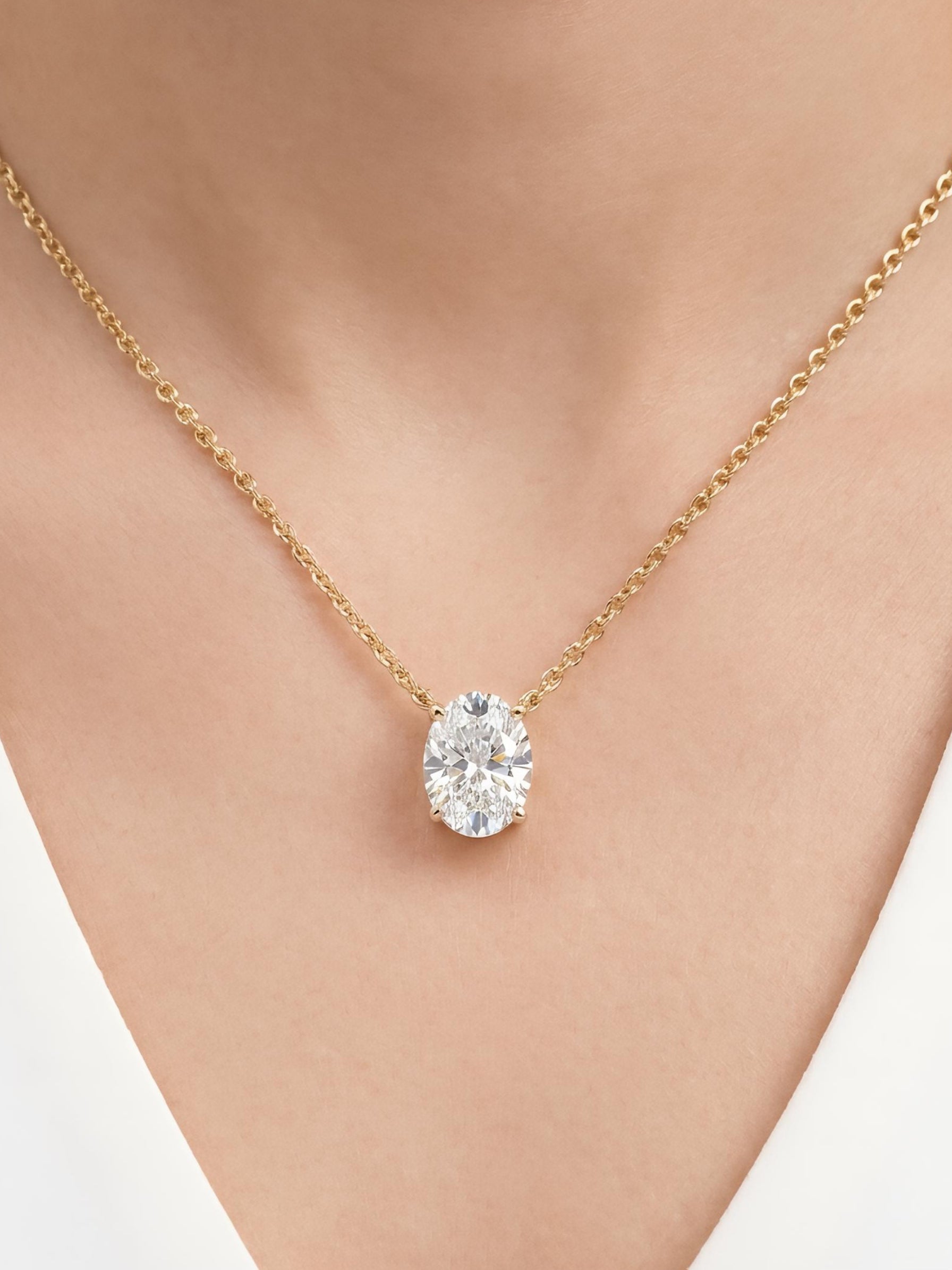 Side view of Solen Vex Oval Lab Diamond Solitaire Pendant in 14K Yellow Gold - Fiona Diamonds