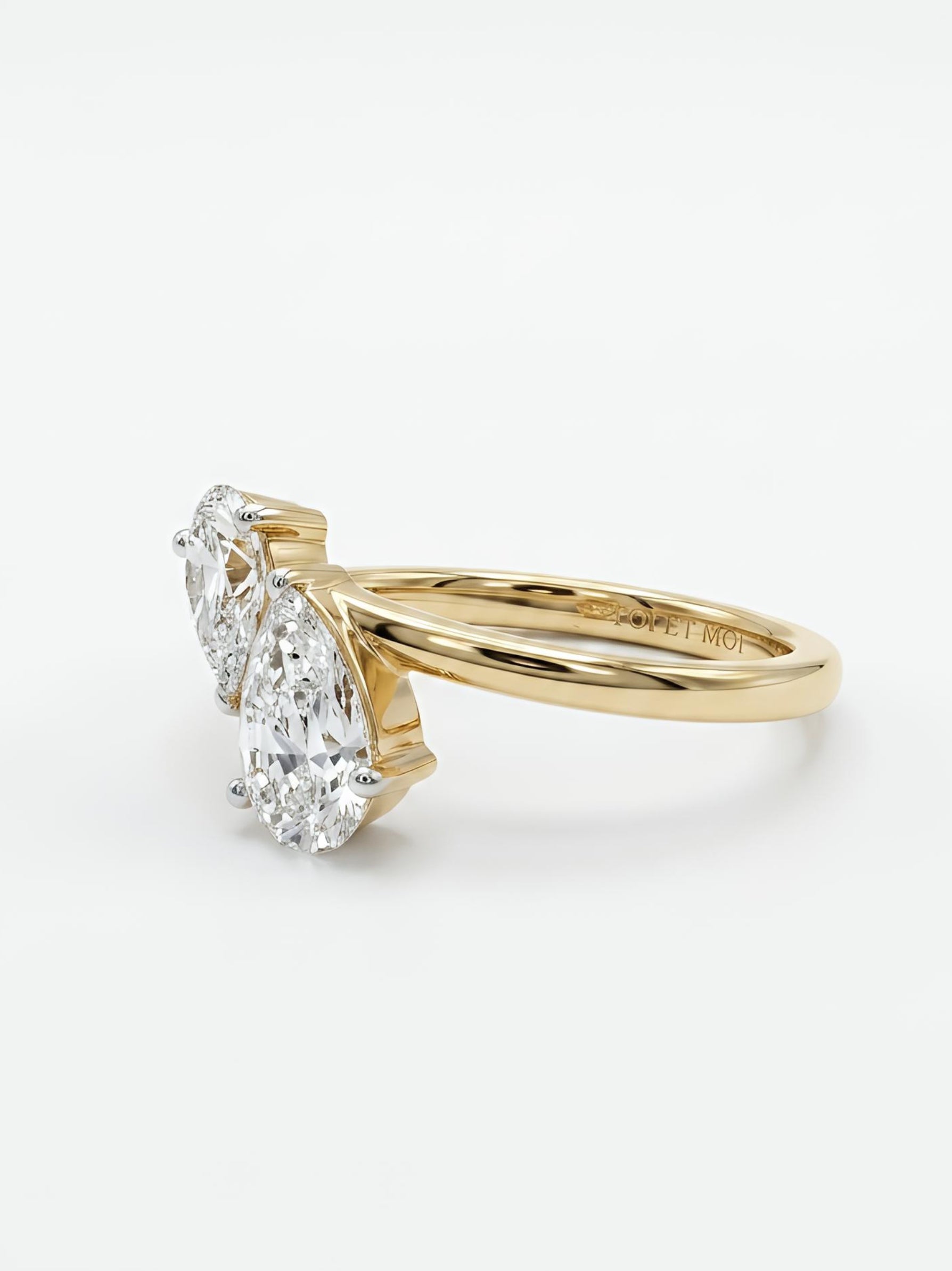 Close-up of Theron Veil Pear Lab Diamond Toi Et Moi Ring set in 14K Yellow Gold by Fiona Diamonds