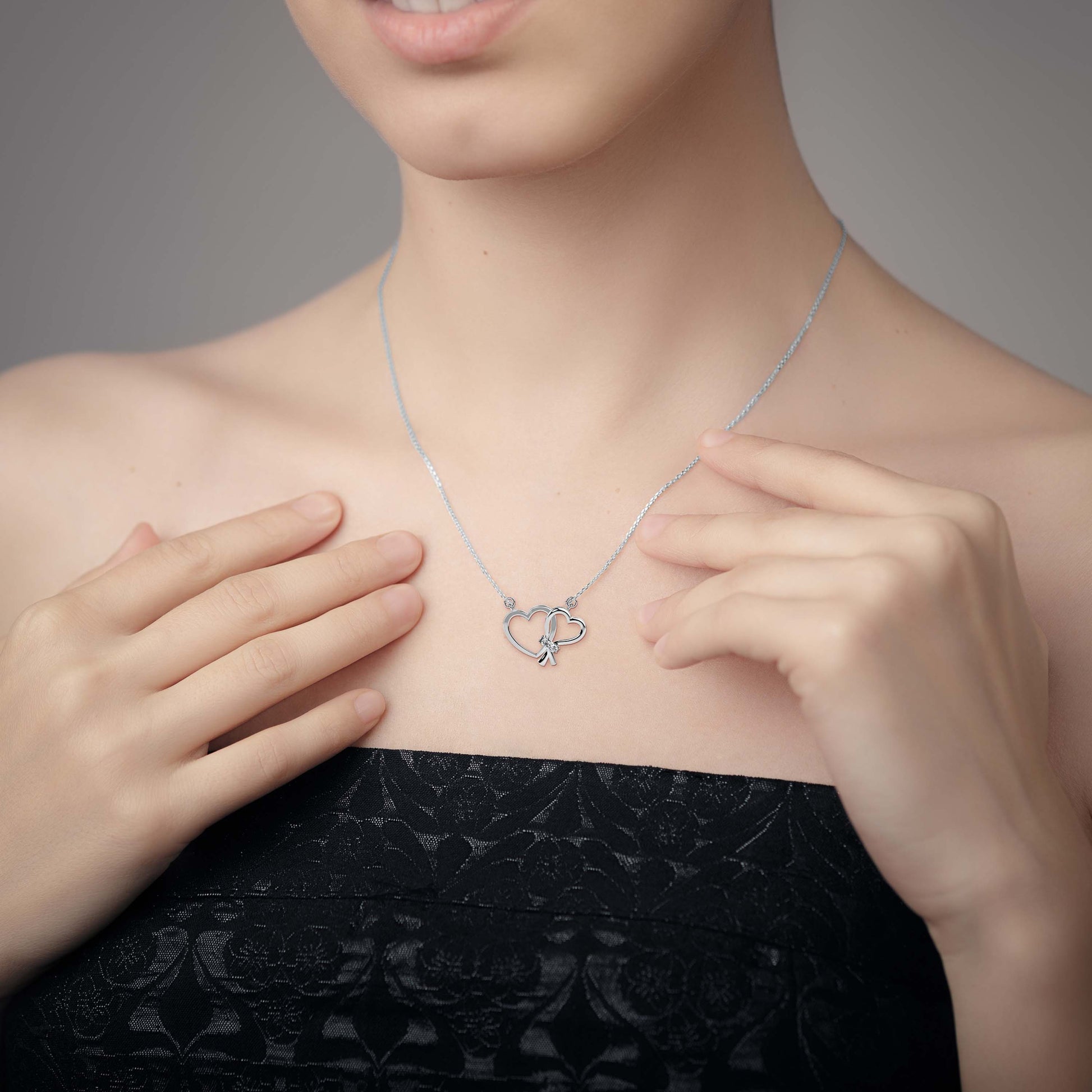 Knotted modern lab grown diamond pendant design Fiona Diamonds