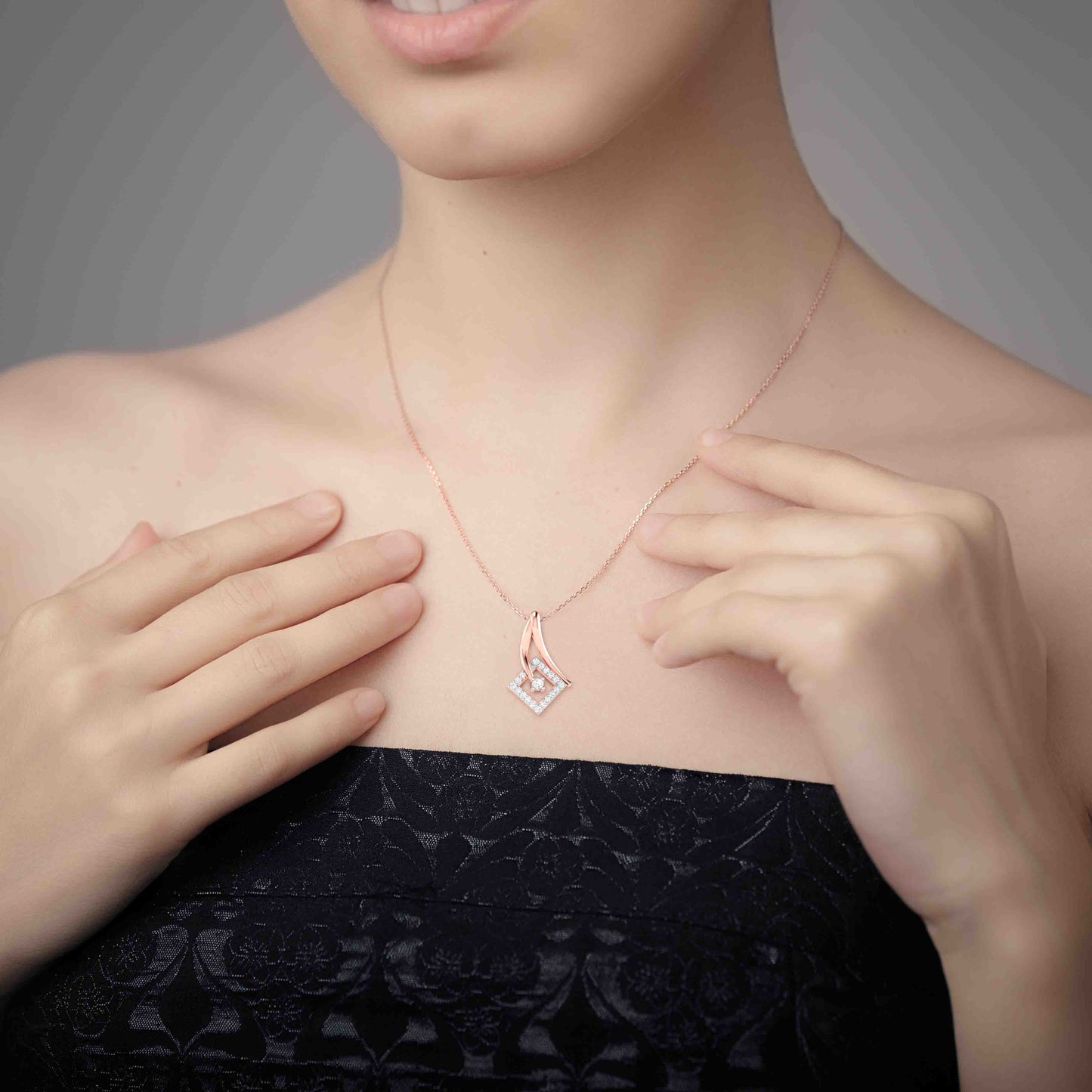Load image into Gallery viewer, Held lab grown diamond pendant design for women Fiona Diamonds
